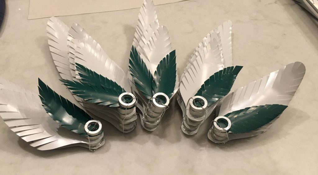 Hunter Douglas Architectural aluminum blinds were transformed into fashionable feathers at the Stitch event.