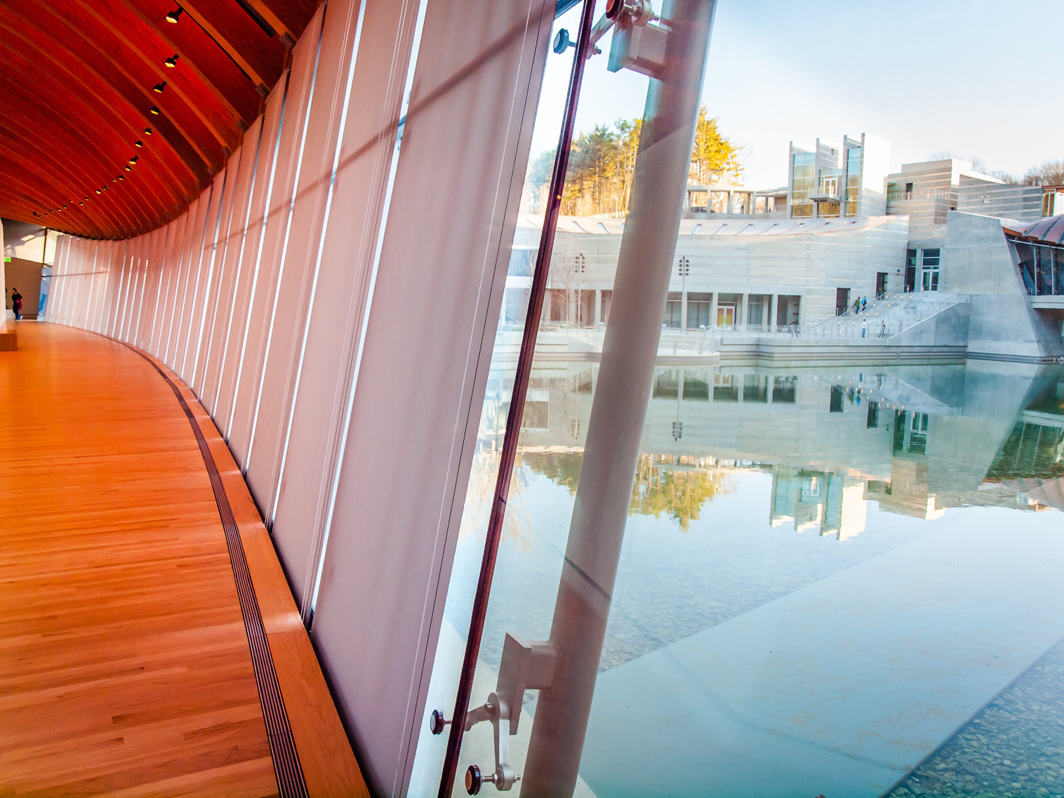 Moshe Safdie's design at the Crystal Bridges Museum of Modern Art included a connectedness to the surrounding nature, which required an equally distinctive design of solar control systems by Hunter Douglas.