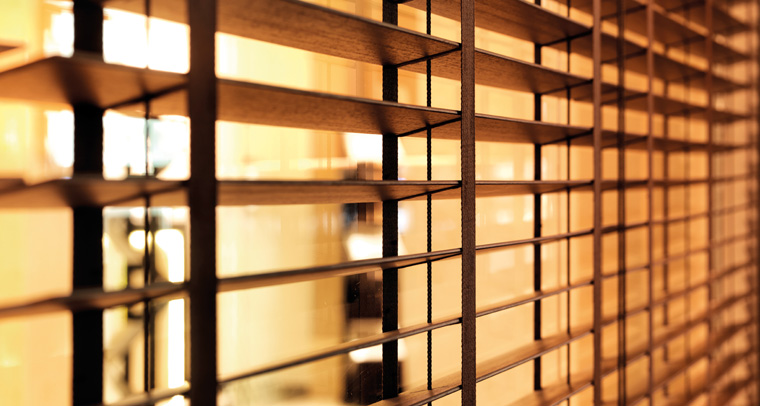 Opting for wood on blinds helps bring natural elements inside.
